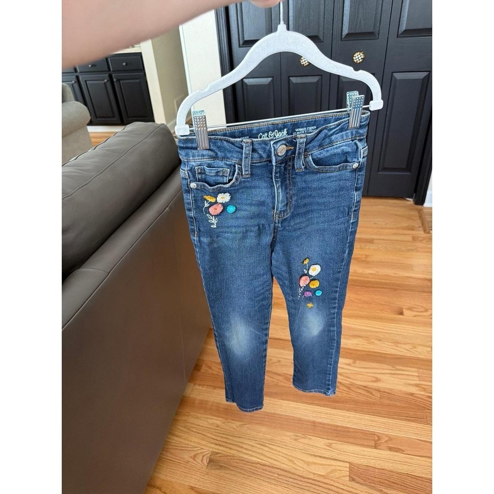 Cat & Jack girl's jeans feature playful vibrant floral embroidery on a medium 6